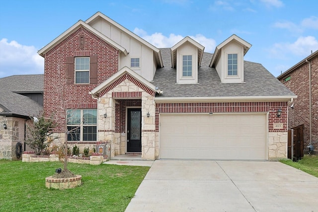 view of front facade with a garage and a front lawn