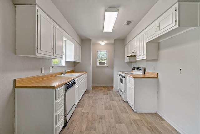 kitchen with sink, light wood-type flooring, dishwashing machine, white range with electric stovetop, and white cabinets