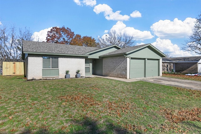 ranch-style house featuring a front lawn and a garage