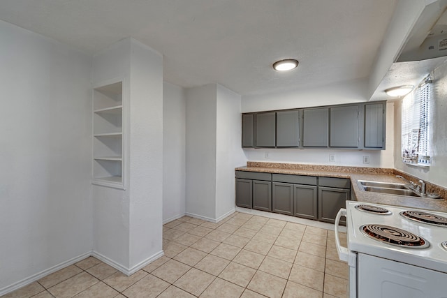 kitchen with gray cabinetry, sink, white electric stove, and light tile patterned flooring