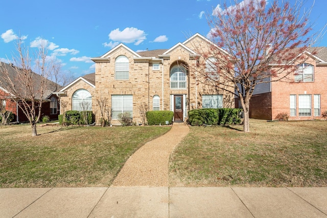 view of front property featuring a front lawn