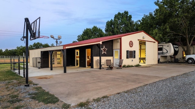 view of front of property with an outdoor structure