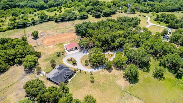 birds eye view of property with a rural view