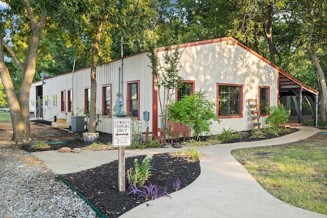 view of front of property with cooling unit