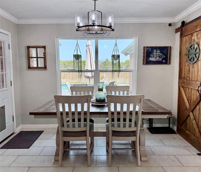 kitchen featuring decorative light fixtures, a barn door, stainless steel fridge with ice dispenser, and crown molding