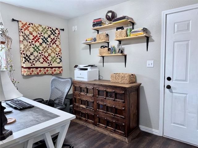 office area with baseboards and dark wood-style flooring