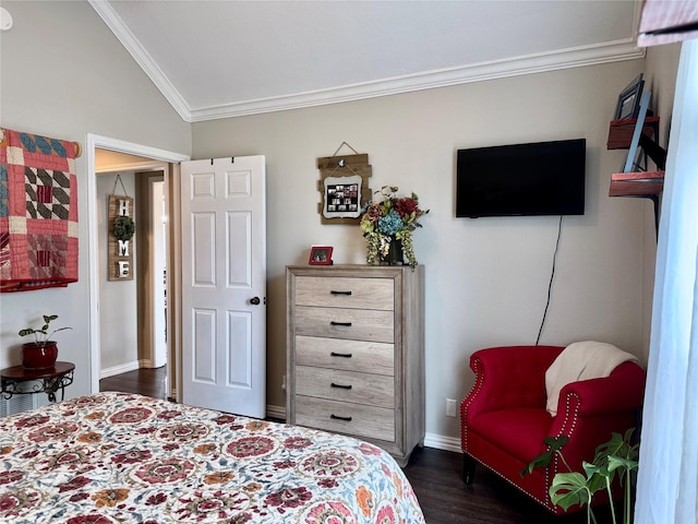 bedroom featuring dark wood-style floors, baseboards, and ornamental molding