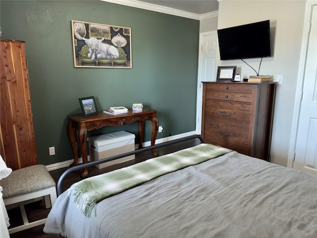 bedroom featuring baseboards and ornamental molding