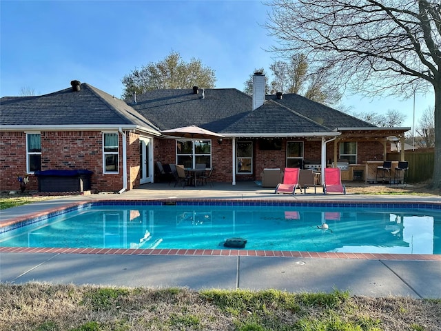 pool with a patio