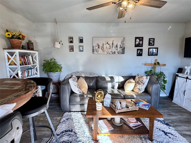 living room with a ceiling fan and wood finished floors