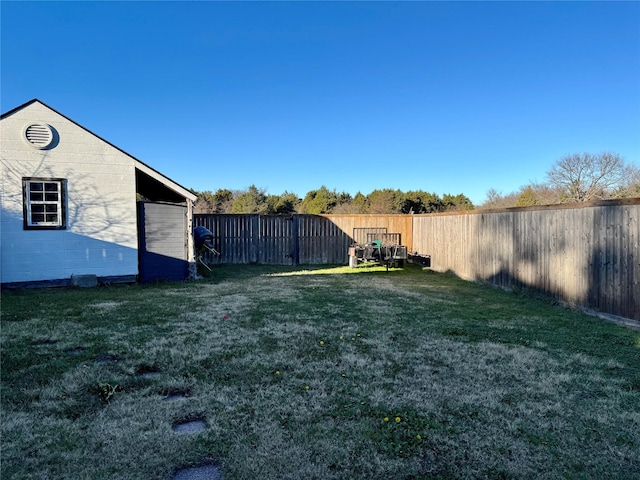 view of yard featuring a fenced backyard