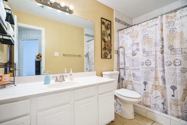 bathroom with a shower with curtain, tile patterned flooring, vanity, and toilet