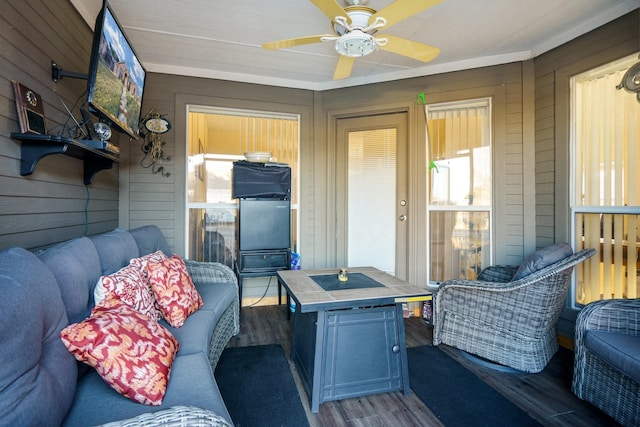 deck featuring outdoor lounge area and ceiling fan