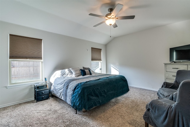 carpeted bedroom featuring vaulted ceiling and ceiling fan