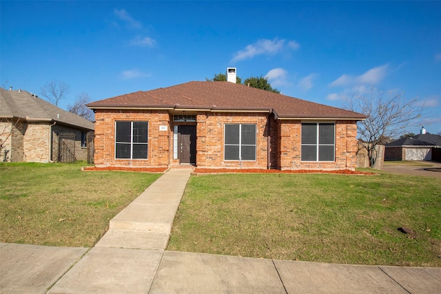 ranch-style home with a front yard