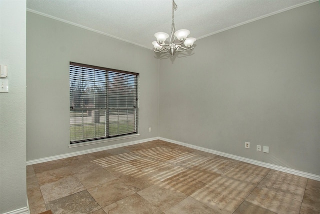 spare room with crown molding and a notable chandelier