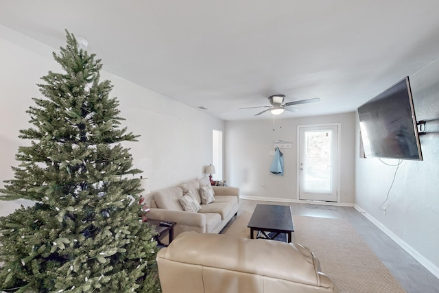 living room featuring ceiling fan