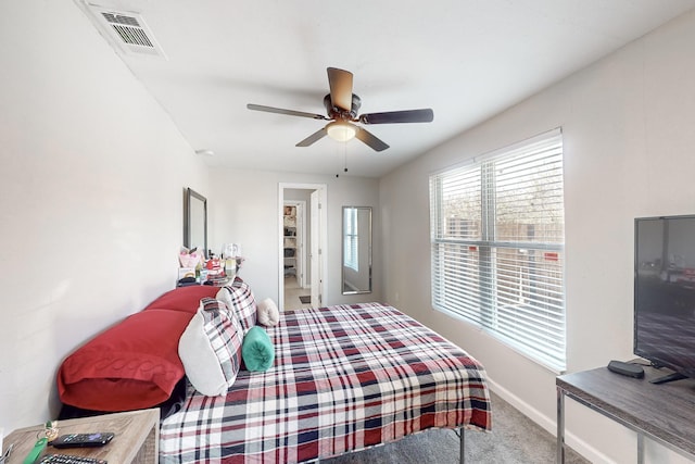 bedroom featuring ceiling fan and carpet floors