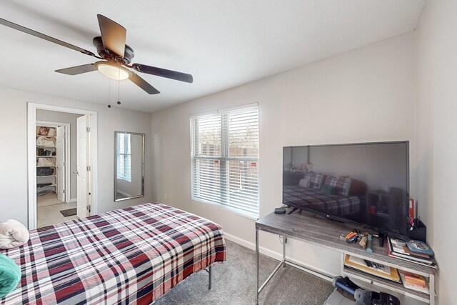 bedroom with light colored carpet and ceiling fan