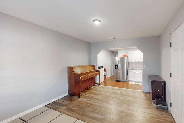 miscellaneous room featuring light wood-type flooring