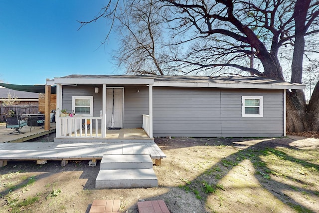 view of front of property with a wooden deck