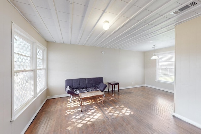 sitting room featuring wood-type flooring