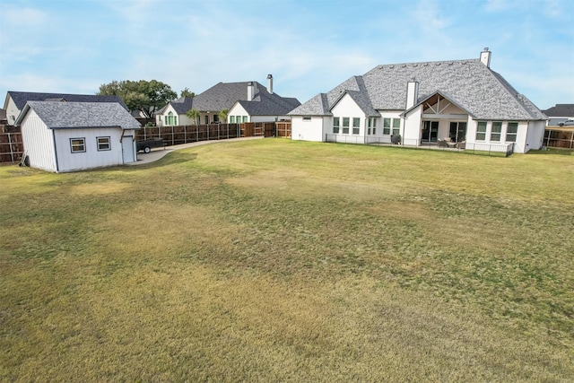 view of yard with an outdoor structure