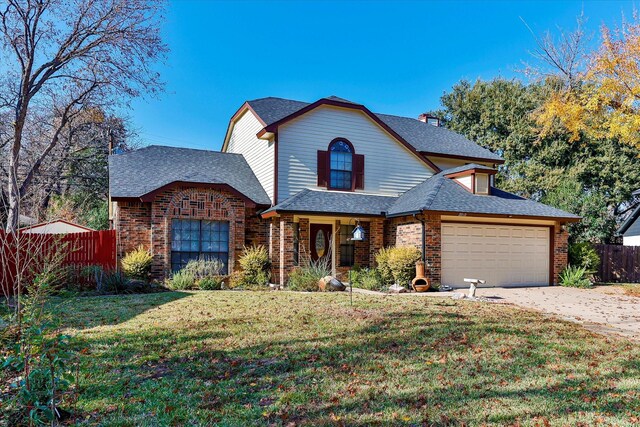 front facade with a front yard and a garage