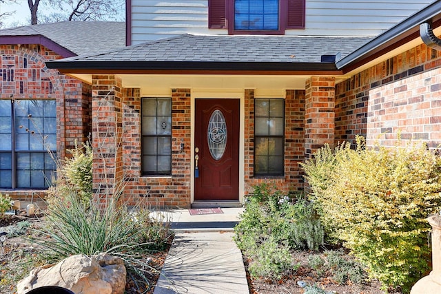 property entrance featuring covered porch