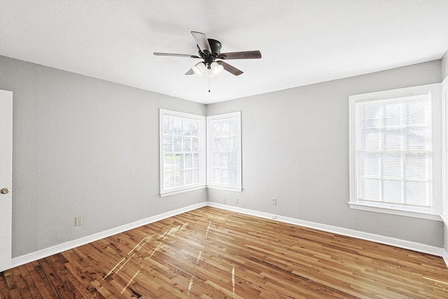 unfurnished room featuring ceiling fan and wood-type flooring