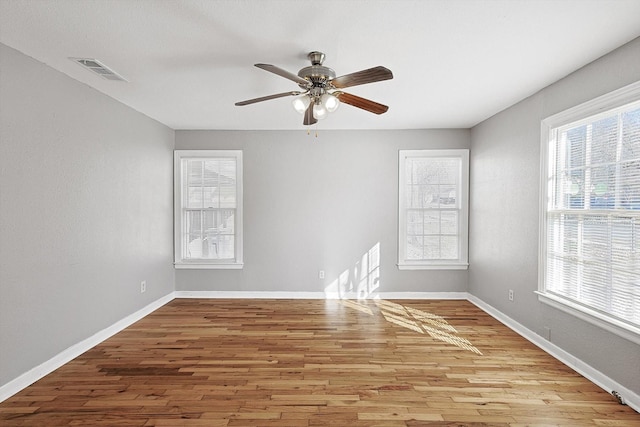 unfurnished room featuring ceiling fan and light hardwood / wood-style floors