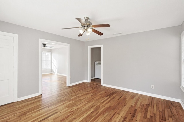 spare room featuring hardwood / wood-style flooring