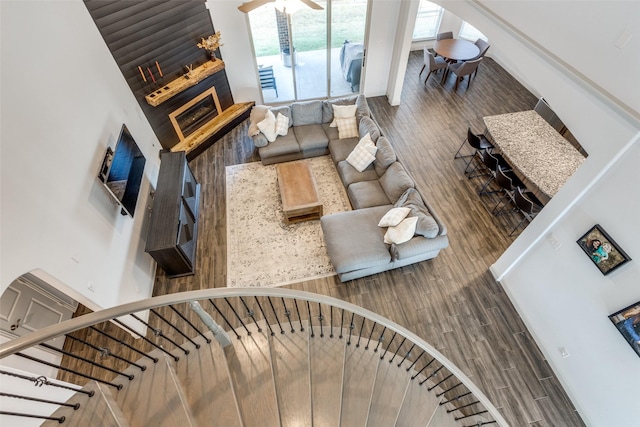 unfurnished living room featuring dark wood-type flooring