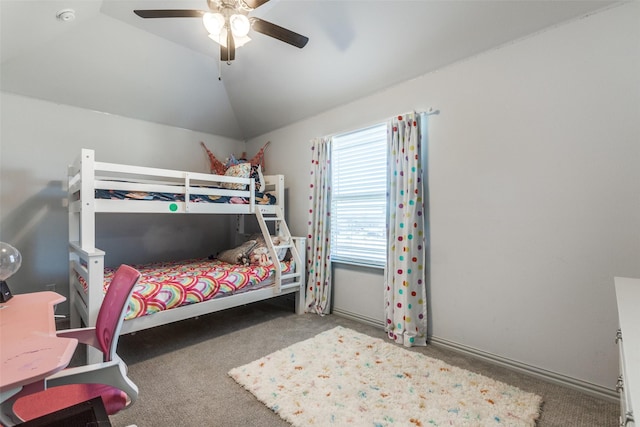 carpeted bedroom featuring ceiling fan and lofted ceiling