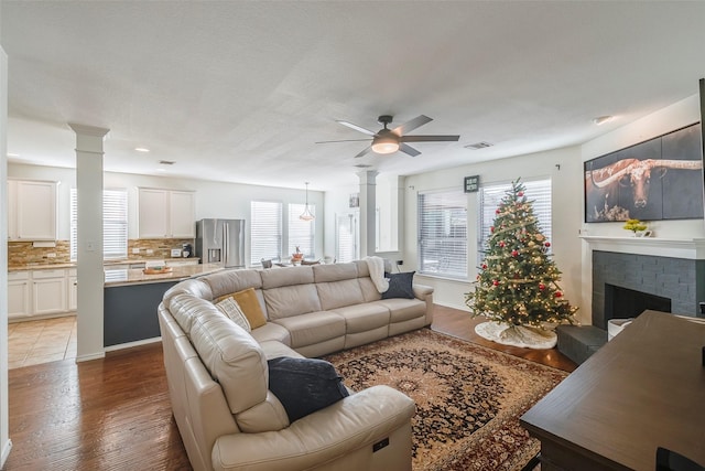 15404 Adlong Dr, Fort Worth, TX 76262 - living room with healthy amount of natural light, ceiling fan, and light wood finished floors