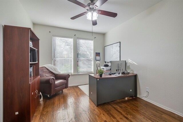 office space with ceiling fan and dark hardwood / wood-style flooring