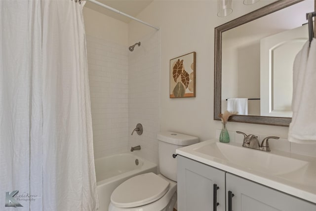 full bathroom featuring vanity, toilet, and shower / bathtub combination with curtain