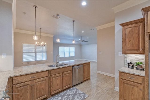 kitchen featuring dishwasher, sink, light stone counters, kitchen peninsula, and ceiling fan with notable chandelier