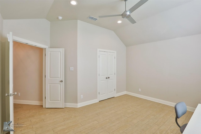 interior space with ceiling fan, high vaulted ceiling, and light hardwood / wood-style flooring