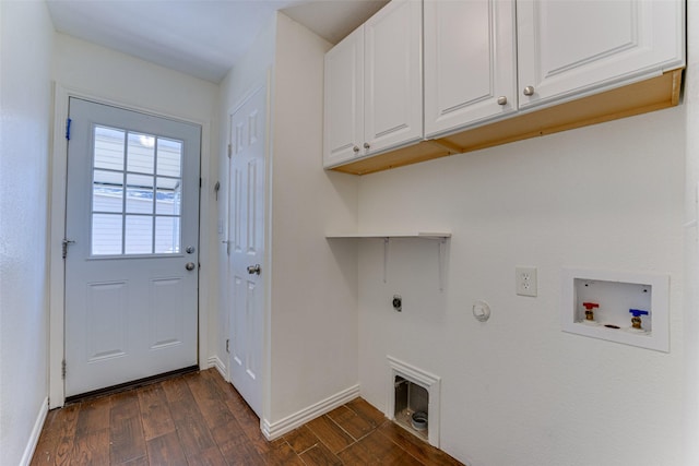 laundry area featuring cabinets, washer hookup, electric dryer hookup, dark hardwood / wood-style flooring, and gas dryer hookup