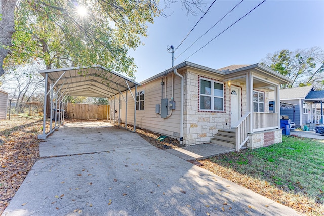 view of front of property with a carport