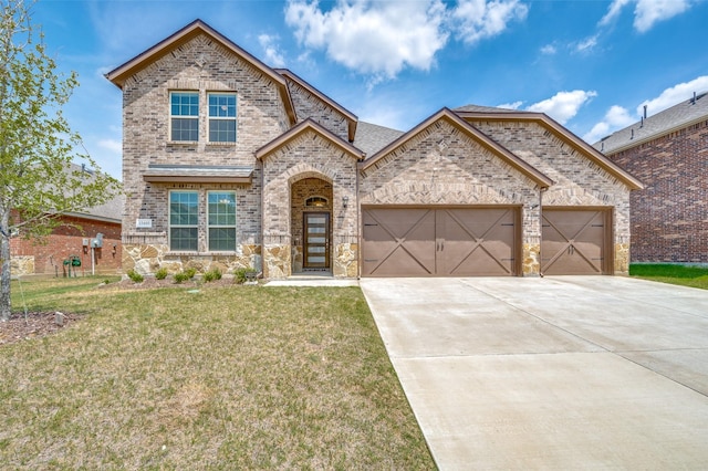 view of front of house with a front lawn, a garage, brick siding, and driveway