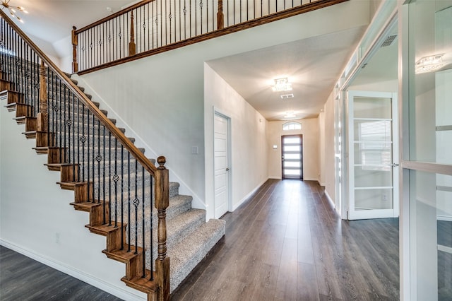 entryway featuring dark wood-type flooring