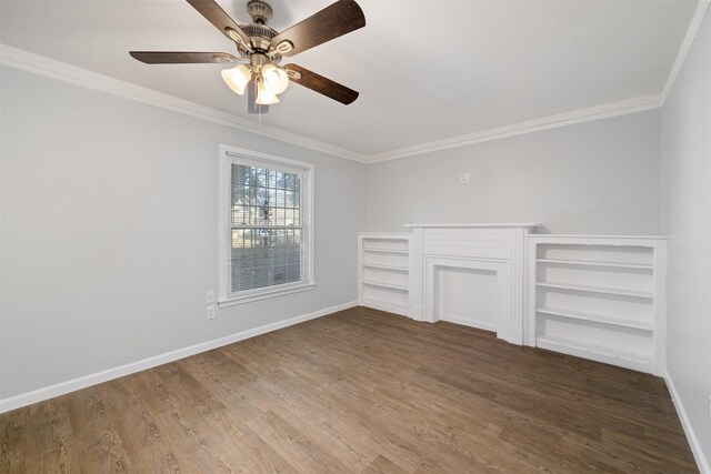 empty room with crown molding, ceiling fan, and wood-type flooring