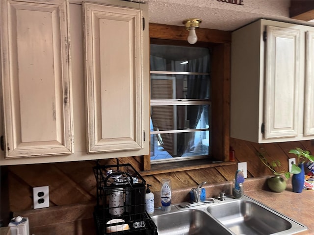 kitchen featuring a textured ceiling