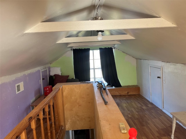 bonus room with dark hardwood / wood-style floors and lofted ceiling