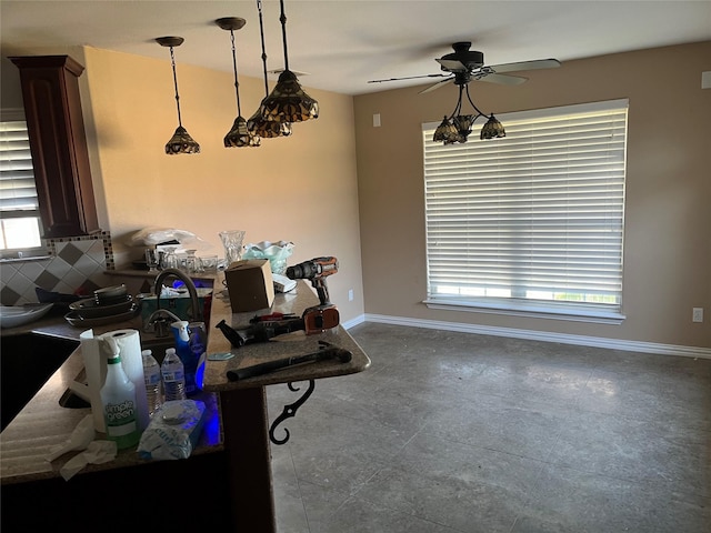 dining room with ceiling fan