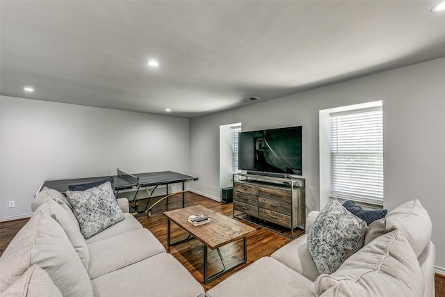 living room with dark hardwood / wood-style floors