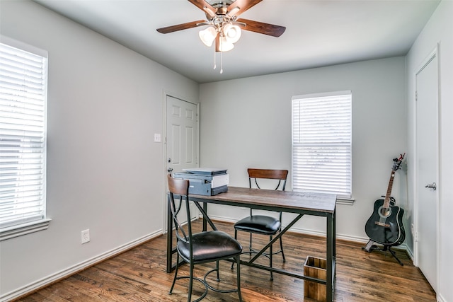 home office featuring ceiling fan and dark hardwood / wood-style flooring