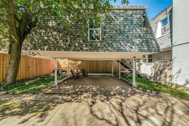 view of patio / terrace with a carport